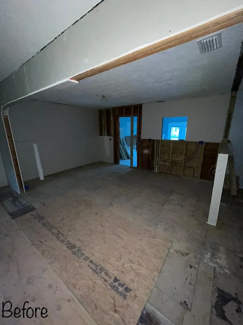 Before: Gutted kitchen area during demolition at a Brandon home before the remodel