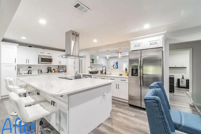 Brandon kitchen remodel with marble-look quartz island, bar stools and white shaker cabinets